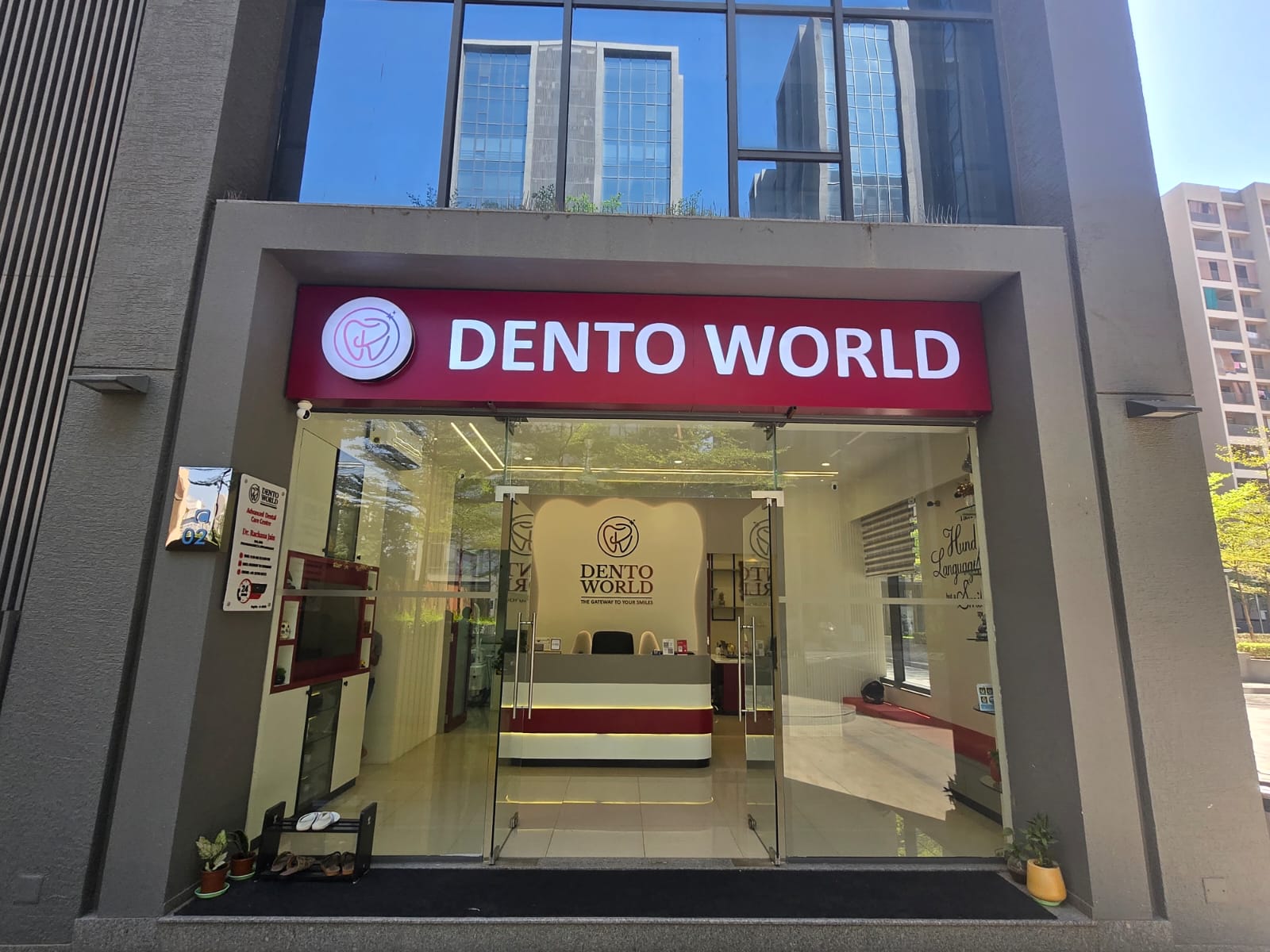 DentoWorld shopfront and signage on Corporate Road, Ahmedabad — look for this from the road